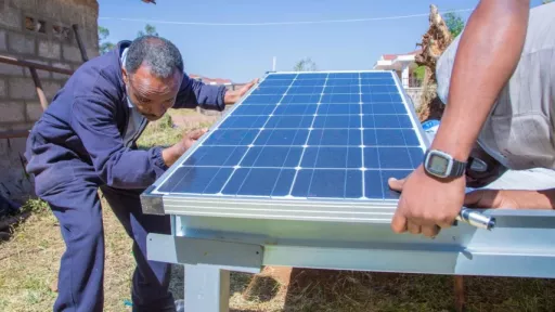 Man installing solar panel