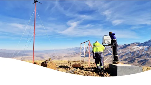 Experts installing LiDAR wind measurement device near Uzunbulak Village in Kochkor District, Kyrgyzstan