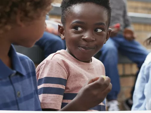 children talking and learning